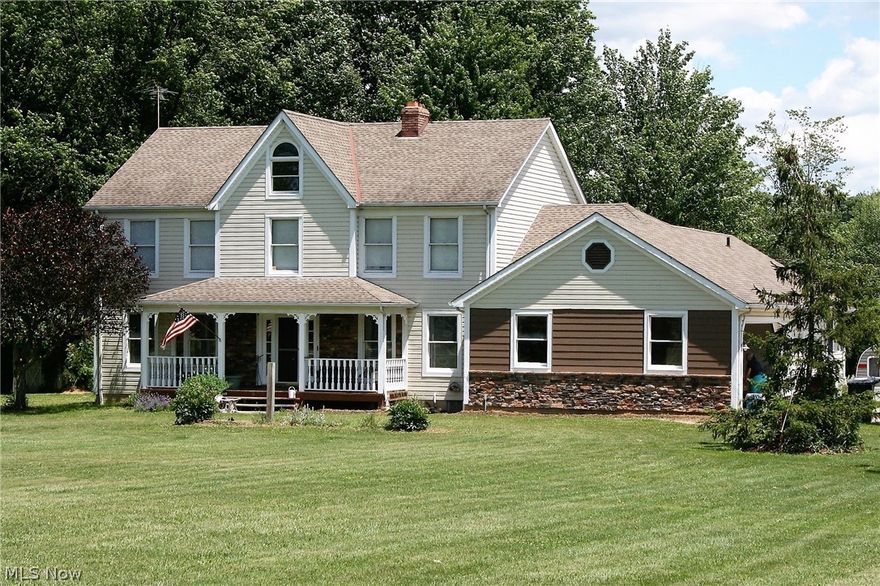 Great country living is to be found here! This is a 2855 square foot home with 5 bedrooms that uses a dual heat source and has a pole barn and other out buildings on nearly 5 acres with a large spring fed stocked pond. In the home along with the 5 bedrooms are 3 full baths, large eat-in kitchen(granite counter tops) accented by stamped "tin" ceiling, huge beamed great room with fireplace, and a formal dining room with chair rail. The home also has a first floor master suite whose sidling patio doors lead into the rear deck(one of the second floor bedrooms also has an en-suite bathroom). The rear deck, which is also accessed from the kitchen, is of a size that can entertain the largest family gatherings. On the rolling acreage, with mature trees, is a 30x40 pole barn(concrete floor & electric & water) with canopied concrete patio. Among the other out buildings is 12x16 building that faces the pond(stocked with bass & blue gill and others is at least 14 ft deep) and could be used as a su