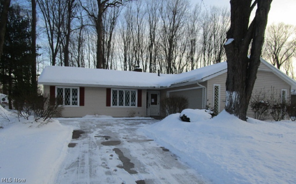 Lovely ranch home on deeply wooded lot in North Ridgeville! Features include 3 bedrooms, 2 full baths in over 1436 sq.ft. of living space. Formal living room. Galley-style kitchen with breakfast bar. Gorgeous stone fireplace in family room with glass sliders out to serene back yard patio. Master bedroom with bath, plus sliders out to private patio. Secondary bedroom has glass sliders to side patio. Needs some updating. Great community! Convenient to shops and schools. Don't miss out on this gem! Property is sold as is. Subject to HUD guidelines 24 CFR 206.125. All offers must be submitted with pre-approval letter or current proof of funds.