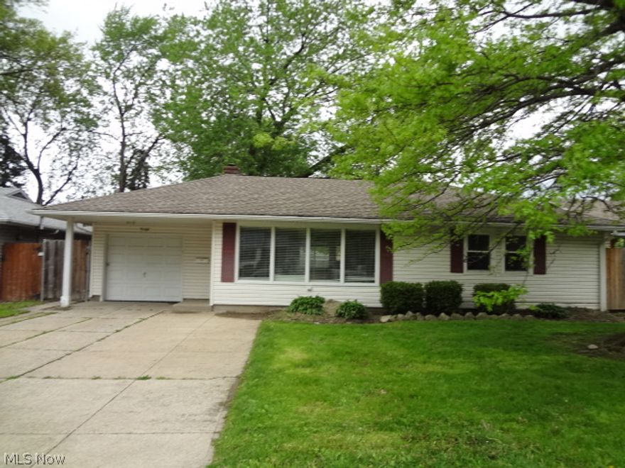 Laminate floors in living room and all three bedrooms. Kitchen has white cabinets and a ceramic floor. Newer roof and windows, plus a wood privacy fence in the back yard.  Purchase for as little as 3 % down payment, This is a Fannie Mae Home Path property!