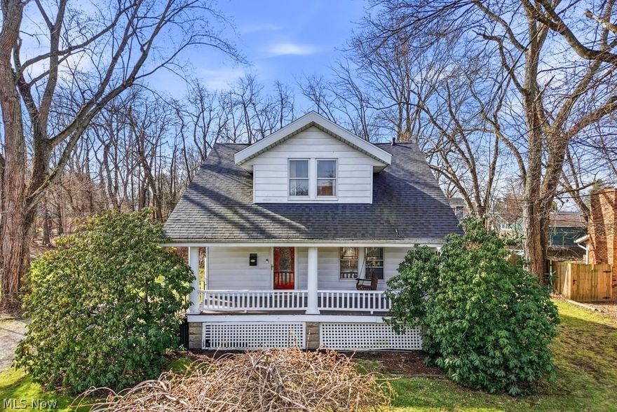 Welcome home to this little gem in Cuyahoga Falls with a massive .66 acre lot and the loveliest front porch you could ask for!! Come see all this charmer has to offer! You will be surprised at how much larger the space feels like than the actual square footage, seriously don't let that fool you! Huge country kitchen with tons of cabinets, a nice island and even a large pantry cabinet. Dining space and 1/2 bath conveniently located off to each side. Living room has brand new carpet, crown molding, and leads up to the 2nd floor where you will find all 3 bedrooms and the full bath. Easily finish the little rec room in the basement for extra space, it's halfway there already! Laundry located in the storage side with washer and dryer that stay so you can just move right in and start your next chapter! With a yard like this, front porch to swing on, fire pit for roasting over a campfire, and right up the road from Water Works Park, you can enjoy the great outdoors all summer long!! Even has a nice storage shed for your mower and garden tools because you have room for the most AMAZING garden here!! Call and schedule an appt right away! Roof replaced '22 HWT '25 Carpet '26