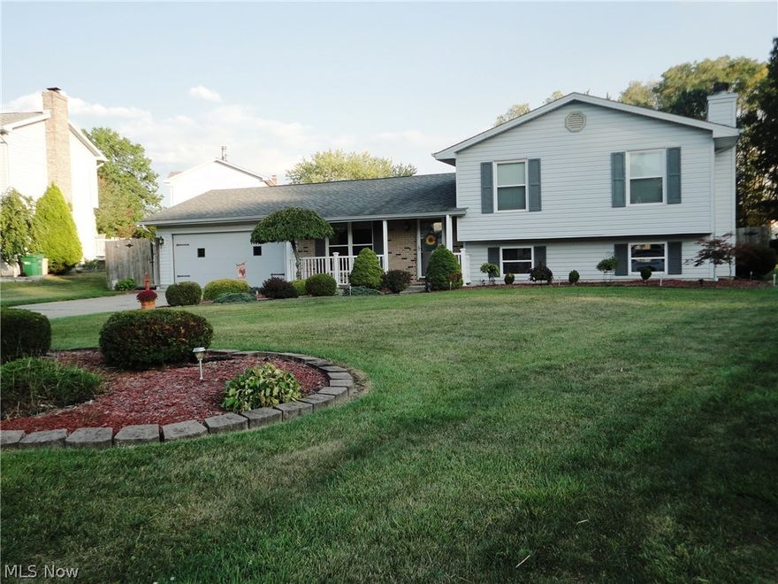 Move right in to this meticulously maintained spacious 3-level split with huge fully-fenced back yard. The cheery bright kitchen with granite countertops and beautiful white cabinets includes a vaulted ceiling and skylight with plenty of counter space, breakfast bar and appliance garage. It flows into the spacious dining area with french doors leading to the back patio and huge back yard, great for family fun and it's fenced in, providing freedom and security for your pets. The spacious family room with fireplace leads to a full bath and private office/den/workout room and laundry room in the lower level. If you have a king or California king bed, this master bedroom is for you. There's room for an oversized bed as well as all your large bedroom furniture, with a private entrance to the upper floor full bath. The roof, windows, bath countertops, kitchen countertops/backsplash, and hot water tank were all replaced with the past several years. If you're looking for a home that has been b
