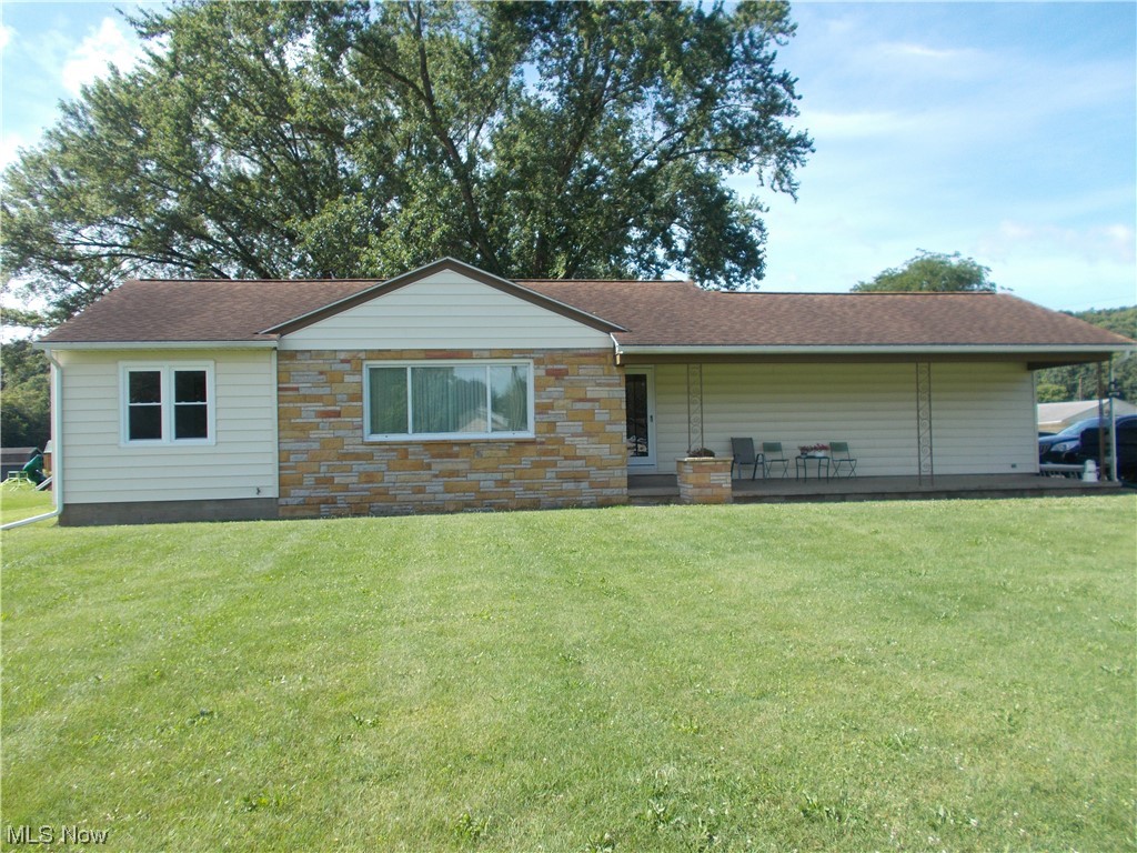 This is the ranch home that you have been wanting to own. Located on a corner lot with .56+- acres and just minutes to West Lafayette and Newcomerstown, and Coshocton. This home has hardwood floors, large living room, eat - in kitchen, many kitchen cabinets, full basement, patio, and a large front porch. The septic was just totally replaced and other recent improvements. Call today to view this fine home.