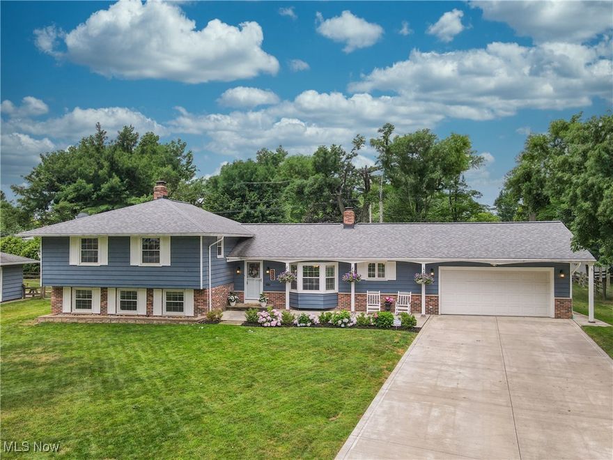 Don't miss this tastefully updated 4-bedroom, 2 full bath split-level home in Highland Heights! Offering the perfect blend of modern updates, functionality, and outdoor comfort. Tucked off main roads on a quiet tree-lined street, this home features a spacious and flexible layout with high-quality finishes throughout. Any new owner will appreciate the attention to detail, modern conveniences and original charm this home has to offer. Quality concrete driveway, front walkway and tasteful landscaping gives this home a sleek modern curb appeal. Inside through the foyer, you'll discover modern LVT flooring, recessed lighting, and an open kitchen/living/dining concept. Granite countertops, stainless steel appliances (new fridge, dishwasher, microwave), custom cabinetry, tile backsplash and a center island with bar seating. The main living areas flow seamlessly, ideal for entertaining or everyday living. Upstairs, you'll find generously sized bedrooms with ample closet space and a beautifully updated full bathroom featuring a dual sink vanity, granite tops and ceramic tile flooring. The lower level includes a cozy family room with a fireplace, a fourth bedroom or home office, and a second full bath with a walk-in tile shower—perfect for guests or extended living needs. Step outside to your own private retreat: a stunning stamped concrete patio, perfect for summer gatherings, grilling, or simply relaxing in the beautifully landscaped backyard. Additional highlights include an unfinished basement for storage needs or can be finished for more living space, smart thermostat, locks, smoke & fire detectors, new windows and a replaced sewer line from the house to street. Top-rated Mayfield schools. Conveniently located near Highland Hts park, shopping, and freeway access.