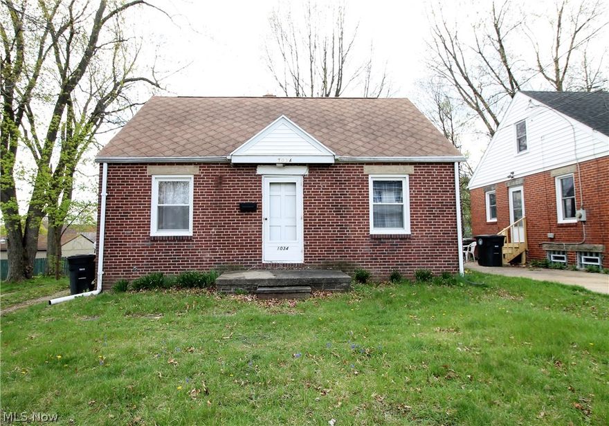 Do you smell that? That's right, that is opportunity! A bit of repair so grab your tools! Here is a two to three bedroom, one full bath cape cod. On the main level there is the large living room, full bathroom, two bedrooms, and kitchen. Upstairs you have another room which could be a bedroom, office, etc. this room has built in shelves and built in drawers. The basement is unfinished, but very clean so much room for storage etc. There is a large backyard. So many possibilities.