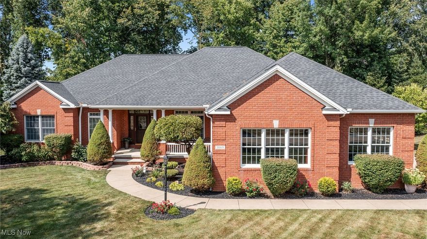 Under Contract-accepting backup offers. Featuring a custom built brick ranch recently remodeled and freshly painted interior 2024. This 4 bedroom, 3 full bath is meticulously kept inside and out. Located in the highly desirable Waterford Crossing sub-division and situated on a large .66 acre corner lot with wooded backyard. The backyard was renovated in 2022 with the removal of over 20 trees to open up and enjoy your evenings on a newly built 20' round fire pit patio or relax on the new 2024 Custom built deck which inlcudes an 8-person hot tub. This home speaks quality throughout with an open floor plan that boasts a great room w/11 ft artist designed ceiling and customized ceiling fan. The fireplace completes the room flanked by 8 ft. windows with transoms which boasts elegance. Let's don't forget the beautiful Brazilian cherry hardwood floor that is the center of attraction. Enter through the French doors with stained glass transom window leading to the office with 9 ft ceilings, crown molding and a bay window with a built-in bench. Open the sliding door to the 14 ft vaulted ceiling four season room with a gas potbelly fireplace to enjoy the beauty of outdoors all year long. The kitchen is a chef's dream with custom cherry cabinets and all newer stainless-steel appliances.  The refrigerator has the Family Smart Hub, Bosch dishwasher, 5-burner gas cook top, built-in conventional oven/microwave with Corian solid countertops and new backsplash. The Primary bedroom with tray ceiling, crown molding with custom fan leading to the primary bathroom. Walk-in closet and new stone vanity top with custom built cherry cabinet. Second full bathroom all new walk-in shower and new stone vanity top with custom cherry cabinet. Lower level has 8 ft drywall finished ceilings. Created in 2020 a Junior Suite awaits your guest that prefers privacy. Full walk in shower and living room suite. Just off from the suite is an updated full Man Cave. Large 3-car garage w/ builtin workbench.