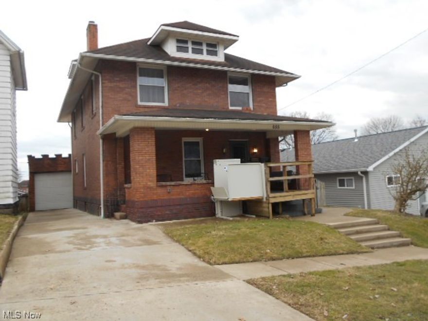 ont miss this 2100+ s.F brick 2 story close to downtown . The home is handicapped accessible with a lift to access front porch and a chair rail to reach the 2nd floor. Beautiful oak floors and trim compliment the oak pocket doors ( one set of doors is solid oak and the other set is oak and glass. ) The home is heated efficiently with hot water heating system that provides steady radiant heat. The 3rd floor has been partially finished and there are materials to finish if the new owners want additional storage or a playroom for the kids. The windows have all been replaced with vinyl thermopane  units . There is a large covered porch on the front and a covered patio at the back of the home. The large back yard is fenced in with a small utility bldg. and has alley access. Call today for your private showing .