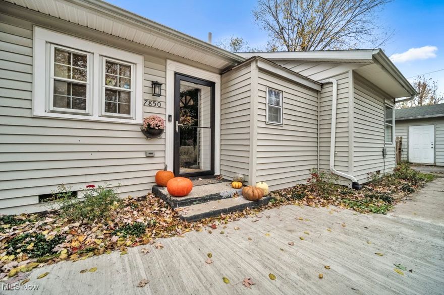 Remarkable opportunity to own this stunning  ranch in the heart of Olmsted Falls. Bordering East River Park and backing up to the Rock River, this area has been highly sought after. Updated Kitchen with custom white shaker cabinets, solid wood with dove tail drawers and soft close hinges. Newer sink, modern faucet and LED light fixtures have been added The custom built-in white shaker buffet features glass cabinets and 5" custom cove crown molding has been added to the vaulted great room for additional storage. Newer flooring has been installed throughout the entire home, featuring brand new commercial-grade (lifetime warranty) waterproof vinyl. The original attached garage has been converted into bonus living space, which could be used as a 3rd bedroom, home office or separate Family Rm. This property is situated on almost a full acre of land and sits back off the Road and is nestled next to the Park  entrance with the rear of the property overlooking the thickly wooded area all the way back to the Rocky River The spacious 2 car 35 ft deep detached garage was built in the mid 90's. Furnace and A/C replaced in 2021 both with extended warranty's. Don't miss this opportunity of a lifetime.