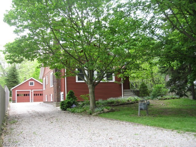 Welcome Home!! Nothing to do but move in this quaint vintage home with Craftsman touches. Featured are hardwood floors throughout, 2 full baths, 4
bedrms, living rm fireplace ready for gas logs. Large dining rm with gorgeous built-in china cabinets & glass doors on each side of window seat. Home feels fresh & clean with new paint throughout. Kitchen newer Bosch dishwasher & microwave. Screened in porch, for added enjoyment features views of wooded lot with over 20 mature trees, large perennial garden with 50 plus perennial collection. Hosta & Hydrangeas. Visit the new concrete patio the sounds of tranquil fountain & views of garden. New sidewalks were added with patio. Lower level includes new water system 2 yrs, new copper pipes added. Electric updated with new box 2017. Newer windows throughout the home including back porch 2016 plus glass block in lower level. Roof with dimensional shingles on house & garage 2007, down spouts, gutters & leaf guards. New insulated vinyl siding from