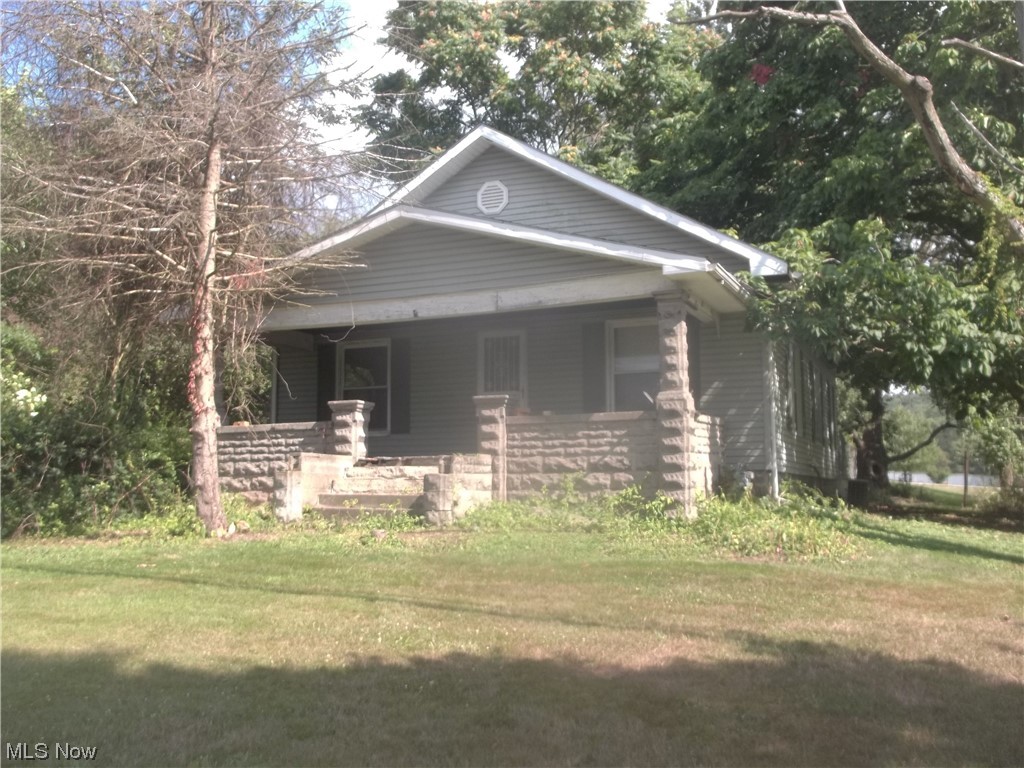 Online Wednesday August 23, 2023 @ 6:00 PM - Real Estate: +/- 2.99 acres with over 500’ of frontage on St. Rt. 39 – 537 X 400 level lot – excellent potential for Commercial or Residential use – Commercial use subject to ODOT approval for ingress & egress – current features a 1,120 sq. ft. vinyl sided 2 bedroom 1 bath home – 1 car detached garage – home in need of TLC – Rehab, refurbish, or build from scratch – you will decide – great location for office, retail, storage, or new residential construction – Tusc. CO. Parcel No. 25-00830-000 – will sell to the highest bidder – bring your building plans & business ideas and set the price for this fantastic location – minutes from golf course, downtown New Phila, Tuscora Park yet outside city limits in Goshen Twp. Terms: A 10% non refundable deposit down day of sale. Balance due at closing. Sells with no financing contingencies. Sells As Is. Any desired inspections are buyer’s responsibility & must be completed prior to bidding. A 10% buyer'