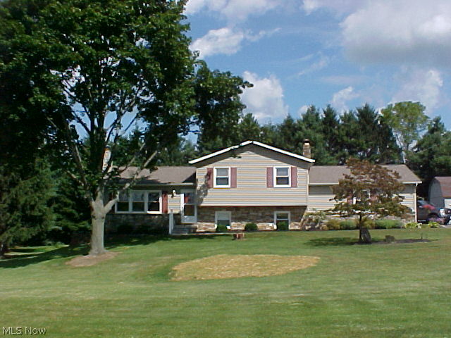 Wonderful country home, many updates including windows, roof, pressure tank, remodeled kitchen, and front porch. Wood burning fireplace with a stone wall and barn beam mantle. Dining Room opens into Living Room for the special dinners. Sun Room has a cathedral ceiling with fan and plenty windows to view the private yard.