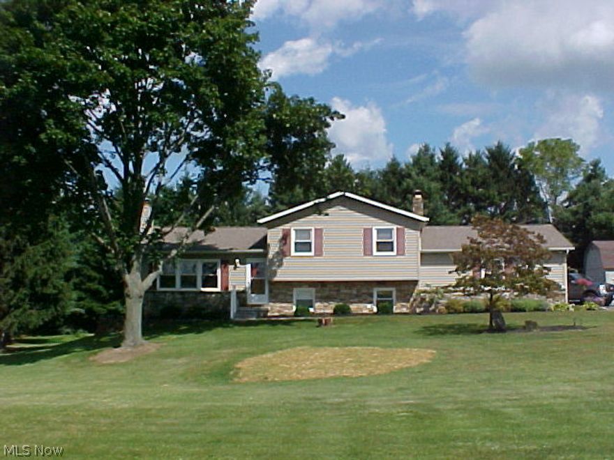 Wonderful country home, many updates including windows, roof, pressure tank, remodeled kitchen, and front porch. Wood burning fireplace with a stone wall and barn beam mantle. Dining Room opens into Living Room for the special dinners. Sun Room has a cathedral ceiling with fan and plenty windows to view the private yard.