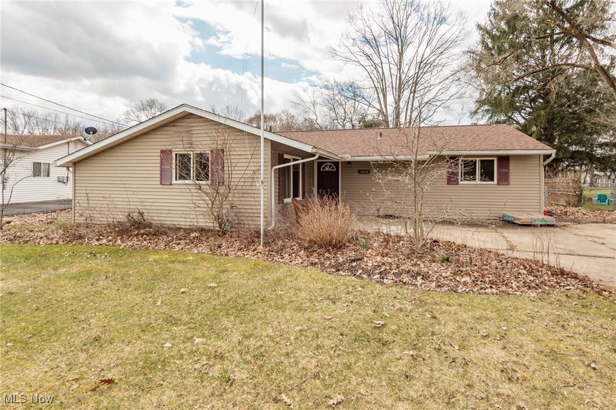 A little TLC and this oversized ranch for the area will be a lovely home.  This 4 bedroom home has a very large fenced yard with a huge shed, and second barn/outbuilding.  The kitchen has been updated with granite counters, ceramic floors, and stainless appliances.  A large living room is very bright.  There is also a family room/solarium with ceramic floors.  The bedrooms are ample sized.  There is a garage, additional parking, patio area, and much more.