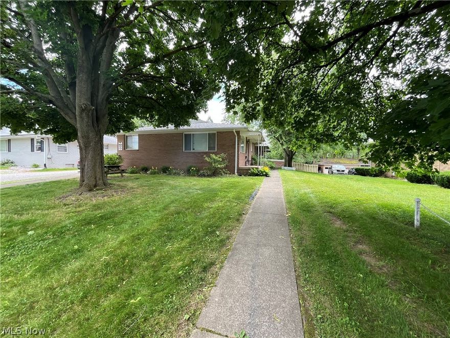 It's a brick.....house.   Okay it's actually a TRIPLEX!  3 units with separate entrances.  2 bedrooms, 1 bath each.  Each unit has an eat-in kitchen.  LVP throughout. 
Separate basements with washer/dryer hookups and lots of storage space.  Quiet street in Louisville.  2 of the units have been updated within the last 2 years.  Detached carport with new support posts.  Don't miss out!  More properties available for purchase, inquire with Listing Agent.