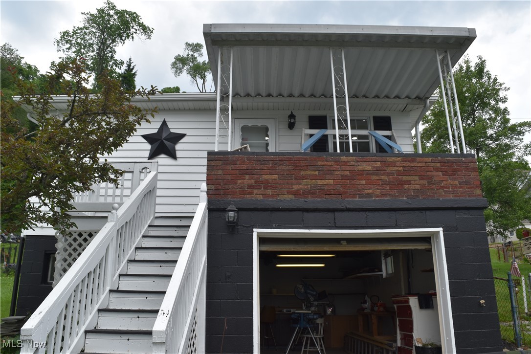 Welcome to 1408 N 9th St in Martins Ferry. This lovely remodeled raised ranch home features 3 bedrooms, 2 full baths, a beautiful kitchen, newer LV flooring and carpeting, and a large basement rec room to enjoy some personal relaxation or time with the family. The home also has a newer electric panel. Soak in the sun this summer on the nice brick rear patio overlooking the beautifully landscaped yard or relax on the not one but two covered porches, in the front or back of the home. Great storage shed in the yard to house all your lawn equipment.