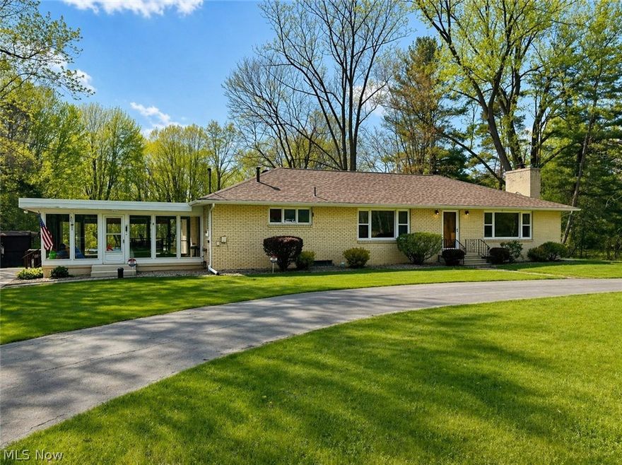 Welcome to this Stunning Brick Ranch positioned on 5 Private acres in the Lakeview School District! A don't Miss opportunity! North of 2,000 sq feet, this property features a Full wrap around Asphalt drive. The driveway continues to the back of home, meeting a privatized 2 car garage! 3 beds, 2 Full baths on the main level with a Full Master bath! The Main bathroom on main level was completely renovated with exceptional tile work in 2023! Kitchen leads into a formal dining room and a spacious living room featuring a Brick fireplace and awesome Built-in shelving! Additional heated Patio room allows for exceptional views of this Private 5 acre lot, surrounded by tree lines and is wooded to the back of the property! Full basement offers tons of storage and the ability to utilize even more living space/storage. Additional plumbed basement bathroom! The Basement walks out to the Garage and back-yard! Brand new Boiler in 2026! Roof replaced in 2018 and porch roof 2026. Blown-in attic Insulation 2022! Garage door lifts and springs replaced in 2026! Furthermore; the new owners can enjoy a well maintained above ground pool in the backyard! Pool has been opened every year the current owners have occupied the home. Heater available! Multiple storage sheds in the backyard! The location of this Property on the quiet Howland Wilson road is roughly 1 mile from Route 11 the way the bird flies. This Allows for quick access to travel without highway road noise. Schedule a showing for the possibility of owning this phenomenal Homestead!