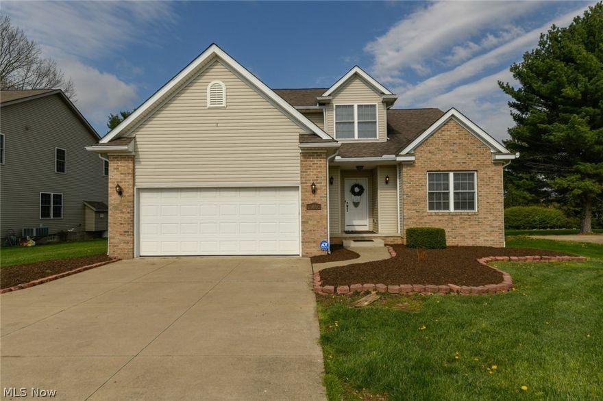 Beautiful newer custom built two story home in plain township. True
gleaming hardwood floors and ceilings ranging from 9 to 11 feet enhancing the entire first floor. The bright
& open kitchen boasts of maple cabinetry, granite countertops and a stainless steel hood. Brand new side
by side two door refrigerator and electric range included. The main level master suite is complete with a
beautiful tray ceiling, on-suite with his and her sinks, Jacuzzi soaking tub, separate standing shower, and
large walk-in closet. Off the master, you'll find another bedroom and a full bath. The great room has a
swank gas fireplace with simple on/off switch and remote controlled ceiling fan. Upstairs you will find the
two remaining spacious bedrooms with ample closet space, another full bath, and a large storage closet.
All mechanics in great working order, 30 yr roof shingles, high efficiency Rheem furnace, 50 gal Rheem
hot water tank and 200 AMP labeled breaker box service. You will love the sp