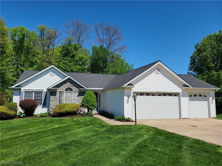 Welcome to 10314 Andover Drive. This well kept 3 bedroom, 2 full bath Ranch home in Twinsburg School District has amazing features! Brand new carpet and paint throughout. Vaulted owner's suite includes full bath with double vanity, Jacuzzi tub, new flooring. Includes dining room, open concept Kitchen and vaulted family room with beautiful gas fireplace. First floor laundry. Upgraded interior insulation added to bedrooms, bath and laundry for sound dampening. Walk out onto a stamped concrete patio that backs up to the amazing Tinkers Woods Park system, providing privacy, views, and convenience to adventure the trails. Whole house alarm system. Oversized 3 car insulated garage with 8 foot high doors, with an efficient natural gas heater and floor drain it is perfect for keeping ice free cars and a workshop. Drain for wash basin as well. Huge basement with high ceilings, newer water heater, high efficiency furnace and regularly serviced. Basement plumbed for full bathroom. Complete tear-o