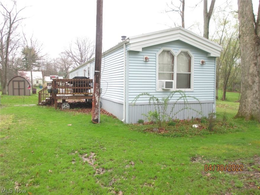 Manufactured home on permanent pillar foundation. 1995 Colony make/Key model. 16 x 76. Three BR's, 2 baths. Master bath has garden tub & separate shower. Property has 6 lots - .75 acres (Parcel #6:  27-0211000124000). Home has metal roof & vinyl siding. Locate on dead end street, fronts on 2 streets. Private location.