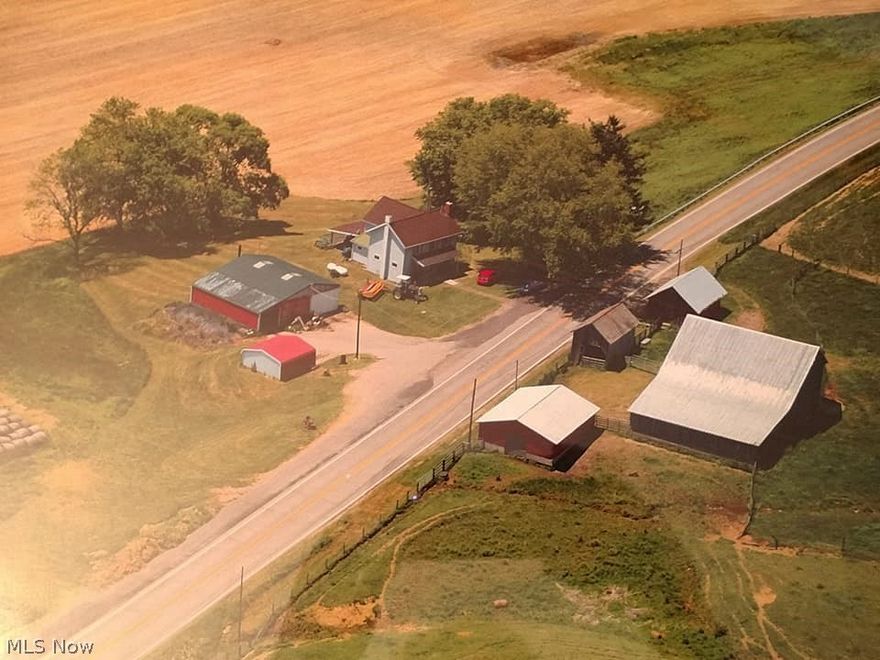 Established FARM! Over 100 ACRES Existing cows with calves on side and bred back (30 momma cows) will be included in the sale as well as the Kubota farm tractor! 2 Story Farm 1900's House, Corn Crib, Machinery Shed, Creek, Spring, Rolling Hill Views, Multiple Barns, FENCED PASTURE, new gutters on the 3 or 4 bedroom house stone foundation, 1.5 baths, Detached garage - cemented, centrally located Zanesville/Coshocton/Newark