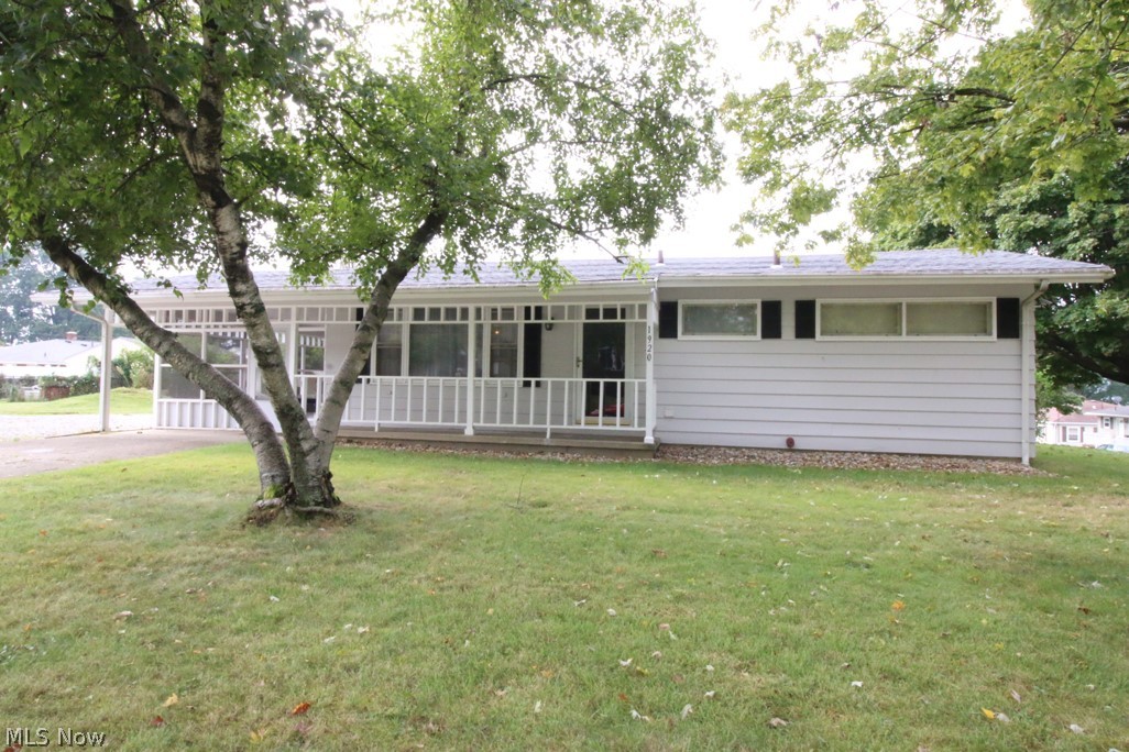 Fantastic one floor living in the well maintained ranch conveniently located to shopping, restaurants and highway access. The home shows very well. Spacious living room with carpeting that was installed in 2021. Interior was recently painted in 8/21. The kitchen has painted white cabinets, ceramic flooring, dinette area and range, refrigerator and microwave. All bedrooms have hardwood flooring for easy care, ceiling fans and mini blinds. The bath was remodeled in 8/21 and boasts laminate flooring, beautiful white vanity with granite countertop, new tub and toilet. The lower level has an enormous family room with recessed lighting and laminate flooring. There is an area designated for a workshop. For a great place to relax head to the enclosed/screened porch located off the side of the home. There is also a cute front porch. For added storage there is a storage shed and 2 car detached garage. The garage door was replaced in 9/21. The roof was replaced in 2020. The seller is offering a h