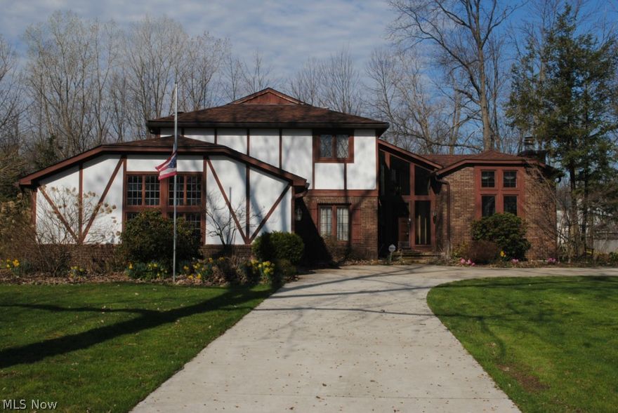 BANK OWNED .... Upscale Contemporary Tudor .... Desirable Amherst Schools.... .... 3 Bedrooms, 2.5 Baths .... Fabulous Master Suite .... Living Room And Family Room  Both Have A Cozy Fireplace .... Formal Dining Room .... 1st Floor Laundry .... Sliders To The Back Yard .... Florida Room With Access To In Ground Pool With Nature Like Stone Floor .... 2 Car Attached Side-Load Garage With Nature Like Stone Floor ....