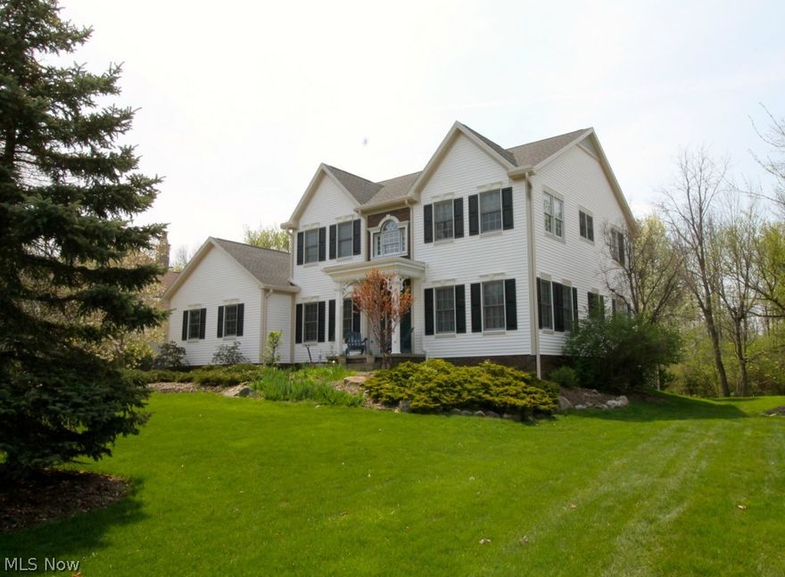 KITCHEN RENOVATION IS COMPLETE!  Home to this beautifully landscaped 4 bedroom, 3 full bath Colonial! Very open and spacious kitchen with new granite countertops, and new dishwasher; complete with an eat in area, which flows into the great room with dual fireplace into the family room which have three panel French doors taking you out to the beautiful breathtaking views.  You will find a two tiered deck which can be accessed from the family room there panel French doors.  There is a utility/laundry room equipped with a large pantry, sink and dishwasher, so you can keep all the dishes out of your guests view and use your large counter space for entertaining. Off the open foyer you will find the living room with double doors for privacy and dining room which leads you back into the great room. There is a full bath on the first floor with shower and in the hallway are 2 big coat closets. Upstairs offers you a large master bedroom retreat with two walk in closets and master bath with big s
