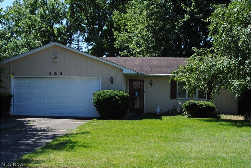 Charming Ranch home on a quiet street will impress.  Warm living room with wood floors opens to dining room and kitchen.  Kitchen offers loads of cabinet and counter space.  Home was a 3 bedroom but owners opened up 2 bedrooms making an extra large master bedroom.  Convenient 1st floor laundry.  Spacious 2 car attached garage.  Enjoy the outdoor patio overlooking fully fenced yard with 2 storage sheds.  Great location close to shopping and highways.  Call agent today.