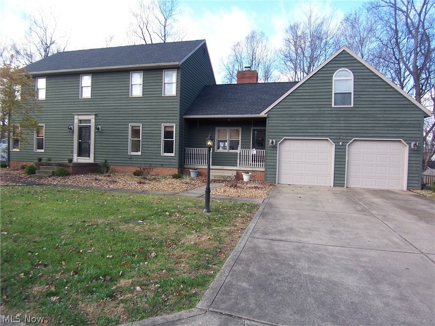 This spacious home (4000 Sq. Ft.) consists of 5 bedrooms (possible 6) and 3.5 baths.  It features hardwood floors, large great room with cathedral ceiling and wood burning fireplace.  Large master bedroom with his and hers walk-in closets.  Also many newer updates. LB#31669737.