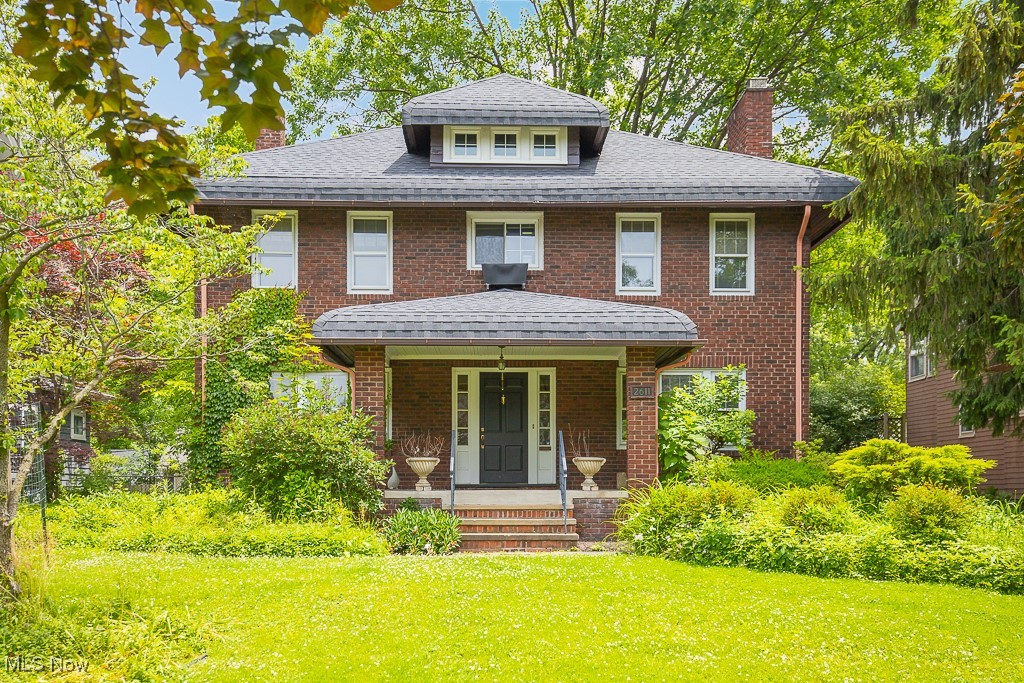This stately brick colonial sits on one of Cleveland Heights' charming brick streets. A classic center hall colonial,
the entry foyer is flanked by a grand living room with a wood burning fireplace, and a formal dining room with
built-in china cabinets. The eat-in kitchen has granite countertops and stainless steel appliances. There is also a
half bath on this level. On the second floor are three spacious bedrooms and a full bath. The primary bedroom
has a cozy woodburning fireplace and an enormous walk-in closet. The third floor provides the fourth bedroom
with an ensuite full bath. The basement has yet another woodburning fireplace plus a wine cellar, workbench,
and laundry. The back yard has a deck, and a 2-car garage with a nice sized lawn area behind it. This home is
ideally located within minutes of restaurants and shops, a short commute to University Circle, University
Hospitals, Cleveland Clinic and downtown Cleveland. Set up a tour today!