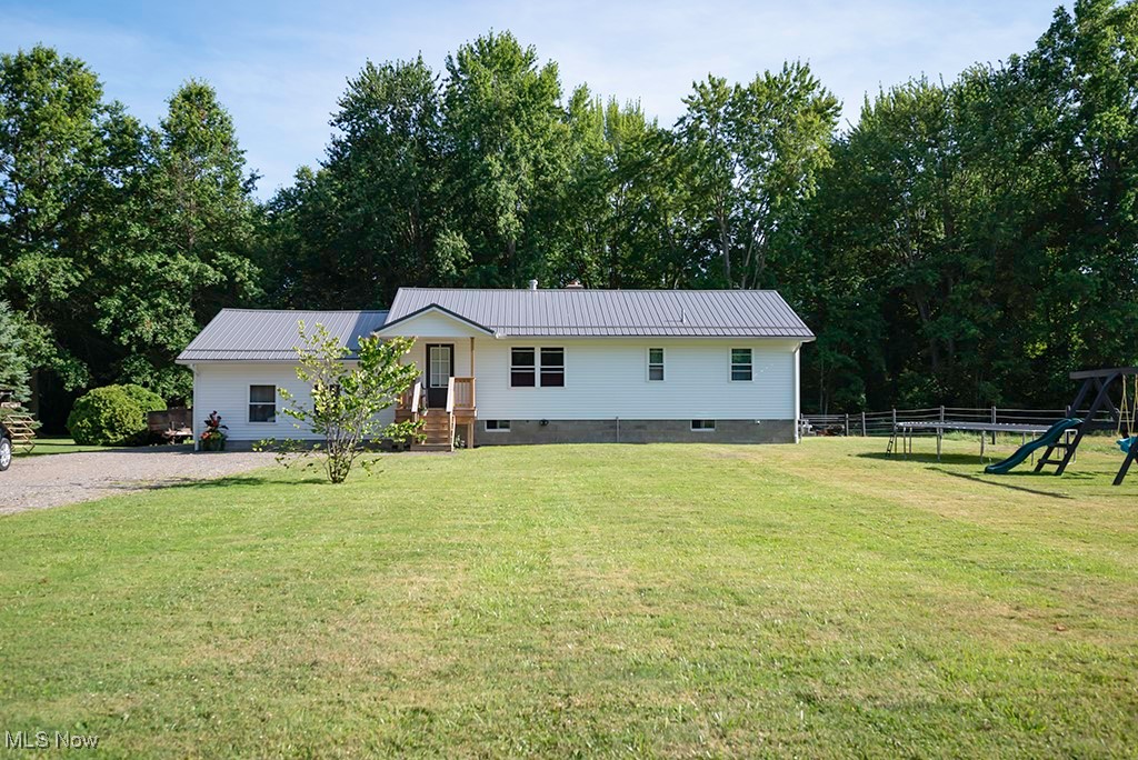 Welcome to 2630 US Route 322, a beautifully updated 3-bedroom, 1-bath single-family home nestled on nearly an acre of land in Orwell Township. Built in 1965 and thoughtfully remodeled, this residence offers comfort, character, and versatility. Open-concept kitchen and living room with oak custom cabinetry and new backsplash. Converted garage space ideal for a large family room or 4th bedroom. New upgrades: metal roof (2021), siding, windows, blown-in insulation, French drains (2023), and porch (2024). New sump pump. New solar system. Interior freshly painted. Outdoor features: patio overlooking barn and fenced in pasture. Call to schedule your private showing!