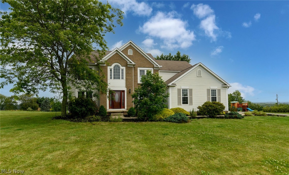 This is a 4 bedroom, 3 full bath, 2 story home that sits on 2.36 acres with a 3 car attached garage! The first floor has hardwood throughout and the views of the outdoor scenery in the 2 story great room will be sure to be a focal point, this while enjoying the fireplace. The 1st floor also has laundry, formal dining room, formal living room, office/4th bedroom and a full bath. Open kitchen layout with a center island gives ability to entertain. The Main bedroom features a walk in closet with two vanities, garden tub and separate shower. 2 large bedrooms with ample closet space and 16x12 loft that overlooks great room. 3 car side load, heated garage. Audio system in great room, family room, kitchen, main bedroom and deck with individual controls! Fully applianced including washer and dryer plus central vacuum system too! This is a must see home. AC-2019, Windows-2015-2018, Laminate Floor-2016, Natural Gas Hookup.