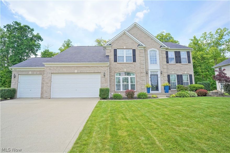 Welcome home to this fabulous home in Parker Lake Estates! This stately brick front w/vinyl siding home offers a 3-car garage with hot/cold water supply. The 2 story foyer w/hardwood flooring leads to the open-concept kitchen that boasts hardwood flooring, maple cabinets, granite counter tops, breakfast bar, gas cooktop & dual wall ovens. The open floorplan is perfect for entertaining. 9 ft ceilings on the first floor.  There is a vaulted morning room off the kitchen that leads to the spacious brick paver patio w/firepit as well as the private backyard. Enjoy the oversized family room w/stone fireplace and lots of windows bringing in natural lighting. For those working from home, there is a first floor office w/glass French doors. Also on the first floor is a half bath, laundry, formal dining room & living room. The owner’s suite has a lighted, trayed-ceiling, large sitting area, & 2 walk-in closets. The glamour bath boasts a white dual sink vanity, corner garden tub & separate shower.