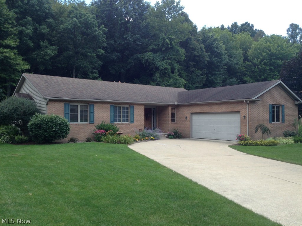 Beautiful brick and vinyl ranch in a fantastic location. This home features 4 bedroom on main level including the master suite with 2 closets, full bath with his/her sink and French doors to patio. 2 1/2 baths total on main level. Open, eat in oak kitchen with breakfast bar and stainless appliances. Living room with brick fireplace open to formal dining room. Fantastic full finished lower level with a 30'x20' family/rec room, office and work out room. There is an attached 2 car garage, a 1 year Americas Preferred Home Warranty, and you get the complete package! Come and see!