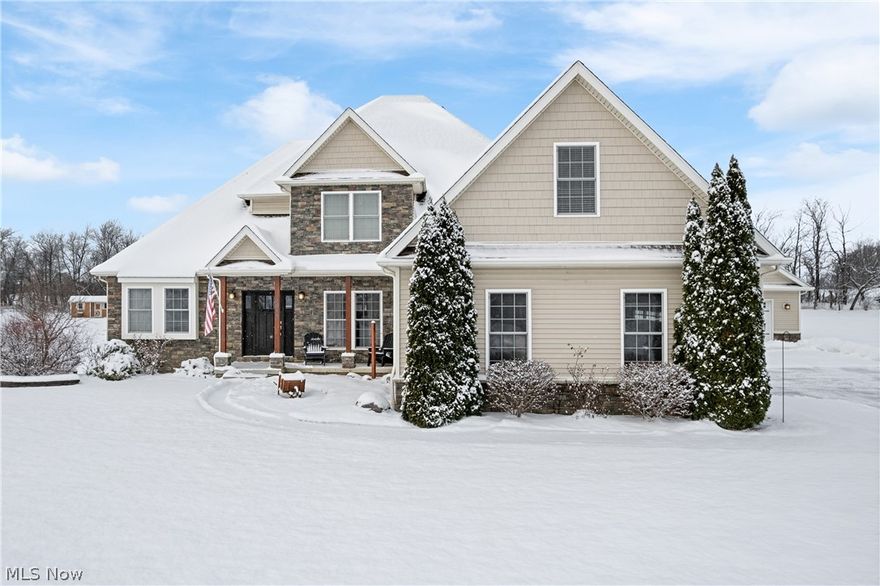 Welcome to this exceptional home nestled on 2 scenic acres in Wadsworth, located within the highly desirable Highland School District, offering space, comfort, and timeless finishes throughout its impressive 3,699 square feet. This beautifully designed residence features 3 full bathrooms and 2 half baths, blending functionality with style.
Vaulted ceilings and oversized windows fill the home with natural light, creating an airy atmosphere. Gorgeous hardwood flooring flows through the main living areas, complementing the elegant yet comfortable design. Neutral tones and quality finishes throughout make this home truly move-in ready.
The spacious kitchen is a true centerpiece with granite countertops, ample cabinetry, and a generous walk-in pantry for exceptional storage. The main-level master suite serves as a private retreat, featuring a large bedroom, expansive en-suite bath, and walk-in closet. Storage is thoughtfully integrated throughout.
Upstairs offers three spacious bedrooms, including an enormous bedroom above the garage — ideal for a teenager or guest suite — complete with its own heating and cooling system and a massive closet, providing privacy and flexibility.
The finished basement provides flexible living space perfect for a recreation room, home theater, fitness area, or entertaining, plus additional storage.
Step outside to enjoy the peaceful backyard oasis featuring a beautiful cedar pergola, a huge picnic and bonfire area, and a playset for kids. A shed adds exterior storage, and the impressive 24x24 two-car outbuilding/garage with full attic access offers even more space for tools, toys, hobbies, or a potential office. With a total of five garage spots on the property and two acres to enjoy, this home combines size, function, versatility, and serene outdoor living — a rare opportunity you won’t want to miss.