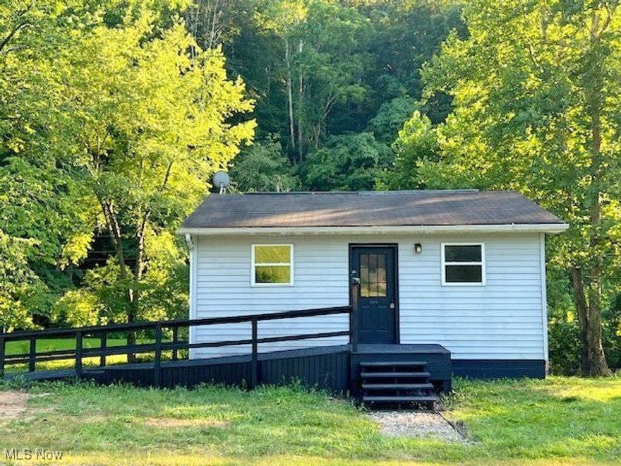 Located at 2408 Clay Road in Spencer, WV (Roane County), this updated one-bedroom home sits on an estimated 1/4 acre lot and offers 400 sq. ft. of living space with an open-concept kitchen and living room that flow together into one spacious area. At the back of the property is a built-in garage, for parking, storage, workshop or laundry use. The home also features a unique bathroom layout, with the potential for customization. Vandale Fork Creek runs just behind the property, creating a peaceful natural backdrop.