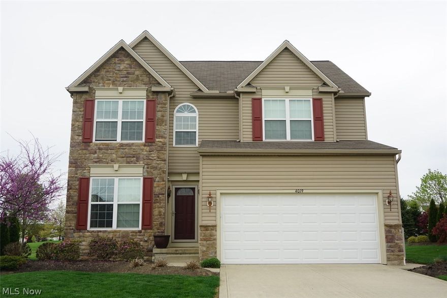 This beautiful colonial features an open floor plan with great natural light.  Sun room is off the kitchen overlooking the beautifully landscaped back yard with deck and patio!   The custom kitchen with a spacious island is open to the sunroom and large family room with fireplace. Availability for first floor laundry that is currently used as a mudroom.  All four bedrooms upstairs are a great size!  Ample storage space can be found in the basement and 2 car attached garage (with storage above the garage).  This truly is a must see!