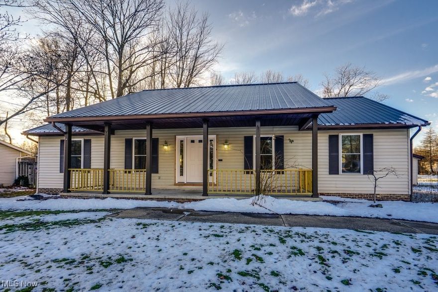 Fully renovated in 2025 and ready for its next chapter, this Aurora home checks all the boxes. Located in Summit County with highly regarded Aurora City Schools, this property has been thoughtfully updated from top to bottom with quality finishes and timeless choices.  Major improvements completed in 2025 include a new metal roof, new windows, and a new front door, providing peace of mind and long-term durability. Inside, the kitchen has been completely redesigned, featuring brand-new cabinetry, countertops, and stainless steel appliances, making it both functional and welcoming. The shared bathroom has been fully updated, and all new flooring and fresh paint throughout give the home a clean, cohesive feel.  Enjoy the added living space with two brand-new porches—one off the dining room, perfect for everyday use, and another off the primary bedroom, offering a quiet retreat. A two-car detached garage adds convenience and storage.  This is a move-in-ready home where the big-ticket items are already done. If you’re looking for a solid, updated property in a desirable Aurora location, this one is worth a closer look.