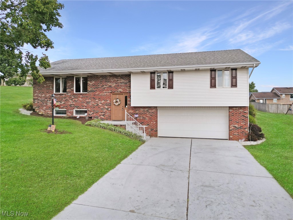 Discover this inviting split-level home situated on a rare double lot in the heart of Wintersville, Ohio. Step inside to an impressive open concept layout that seamlessly blends the dining area and spacious living room, creating the perfect setting for gathering or entertaining. The expansive kitchen features some modern finishes and plenty of storage. The primary bedroom has a full bath attached. Downstairs, you’ll find additional bonus living space ideal for a family room, home office, or guest suite in addition to a half bath. Outside, the expansive yard provides endless possibilities for outdoor enjoyment. With its prime location and turnkey appeal, this home truly offers the best of comfort and convenience.