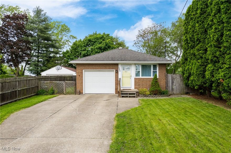 Welcome to this charming two bedroom, one bath ranch home, conveniently located next to schools and the YMCA. The cozy layout is ideal for first-time buyers, downsizers, or anyone looking for low-maintenance living. The kitchen was recently remodeled with new shaker cabinets, tile flooring, appliances, light fixtures and quartz counters. Bath updates include new vanity/sink, mirror and toilet. Enjoy outdoor living with a fully fenced backyard, a side patio great for summer barbecues, and a 1-car attached garage for added convenience. Other recent updates include central air, glass block windows in basement, sump pump, new front door and door to garage. Seller is including a one year home warranty for added peace of mind.