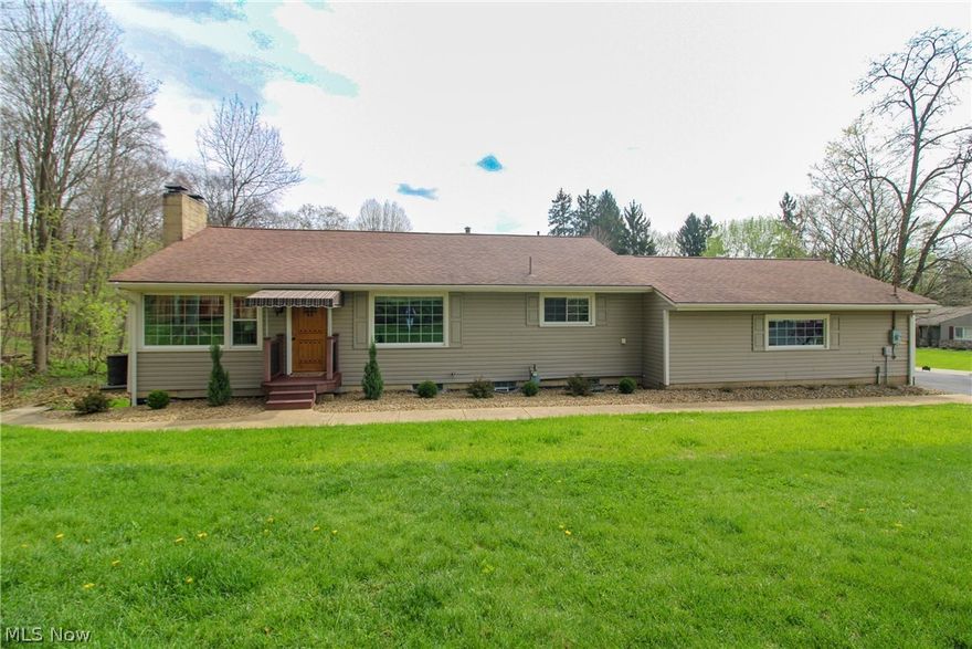 WOW, are you looking for true multi floor living? This home is one of a kind with so much to offer! Sitting perched on a slight incline, this raised ranch home overlooks the neighborhood and its design includes a full walk out lower level! This location offers a peaceful Private Tree-lined Back-yard also has a large shed, and a firepit and lower level patio to enjoy. Calming Natural light floods the home from every room. At first glance take note of the Neutral freshly painted walls giving a light airy feel. Two Full Floors include two Kitchens, two living areas with fireplaces, bedrooms and full baths on each level. The first floor also boasts a half bath, laundry and an enormous mudroom to store all your personals off the 2 Car Attached Garage. Slider doors off the main level living room lead to a covered deck overlooking the outside views. Newer Hardwood Flooring through-out the Main Living Area and Master Bedroom. Luxury Vinyl Flooring has been updated through-out the Lower Level Great Room and Bedrooms. Easy maintenance. The Main Floor has a Master Suite with En-Suite including separate Jacuzzi Tub & Custom Tile Tuscan Free-Standing Shower. Walk in closet. Open Floor Plan features the Kitchen with Maple Cabinets & Black Granite Counters, Custom Moldings, a built in bar, an Entertainment Center w/Fireplace Surround. The Open Staircase and Lower Level feature the Second Kitchen with granite countertops, Large Family Room with Second Gas Fireplace w/updated Remote Control. Two Additional Bedrooms & Full Bath. Shower equipped with Blue Tooth Technology and Multi-function Lighting. Utility room. Custom Blinds. Cool Central Air. Updated furnace in 2024. This home has both HVAC and in the lower level there is an alternative if you like that is baseboard heat as well. Seller Waterproofed basement, documents provided. Electric Fence to stay. The exterior of the home vinyl and stone, and is complimented by a circular drive. Call Today -the possibilities are endless!