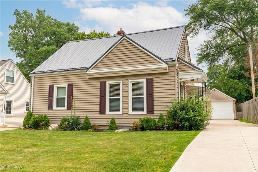This immaculate Bungalow in Cuyahoga Falls is a MUST SEE! Meticulously maintained and filled with updates, this home offers move-in-ready convenience with modern charm throughout. Step inside and see the spacious rooms, gleaming hardwood floors, and abundant natural light. The large great room is a true highlight, featuring oversized windows that flood the space with sunshine. Adjacent to the great room, you’ll find two generously sized bedrooms, one with washer and dryer hookups for convenient first-floor living. The updated full bathroom boasts a walk-in shower with modern glass doors and convenient built-in storage in the hallway. The updated eat-in kitchen features white cabinets, sleek black granite countertops, a tile backsplash, and serene views of the peaceful backyard—perfect for gathering with loved ones. Upstairs, the expansive third bedroom offers a deep closet and built-in storage, making it a versatile retreat. The partially finished basement extends your living space with a spacious recreational room, a half bath, a laundry area with a double-sided utility sink, and plenty of storage. Outside, the well-maintained backyard is an oasis for relaxation, complete with extra driveway space, a detached garage, and a handy storage shed—ideal for outdoor living and entertaining. Updates include: Roof 2024, Fridge 2021, Furnace, Hot Water Tank, Shower reno & Shed 2020, Hardwoods, Granite Counters, Driveway & Fence 2019. Prime location! Nestled in the highly desirable Cuyahoga Falls area, this home is just minutes from schools, shopping, restaurants, downtown, and the highway. Don’t miss out on this pristine, move-in-ready gem—schedule your private showing today!