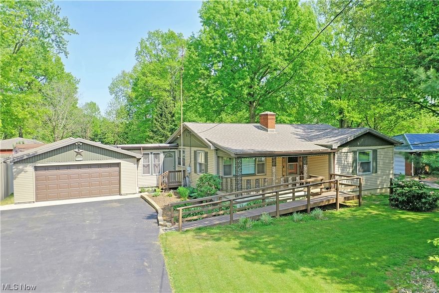 BACK ON THE MARKET! This is your chance! Welcome to 1498 North Road (near the end of Reeves Rd by Blessed Sacrament)! This beautiful 3 bedroom ranch has an attached 2 car garage and sits on more than a half acre of peaceful land in Howland school district. The kitchen has just been updated with soft close cabinets, brand new stainless steel Whirlpool appliances and quartz countertops. The living room on the main level and family room in the lower level each have a wood-burning fireplace. The lower level is also finished for another bedroom as well. The mid century modern front door provides character and the spacious front porch is a shaded place to relax. But the fun really starts when you step out of the back door to 2 tier decks (2017) with a hot tub tucked in that you can purchase separately. Walk out into the wide-open fenced back yard to a gorgeous inground pool that has everything you need to add a heater! All appliances were purchased in 2023, roof 2020, replacement vinyl windows 2017-2023, hot water tank 2017, new garage floor in 2019, blown in insulation in 2015 and a new driveway in 2022. Come see this place for yourself to believe it and get those preapprovals ready as this home wont last long!