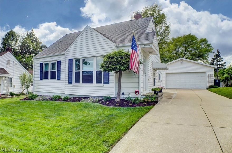 This beautiful cape in the heart of Firestone Park is waiting for you! This home is perfectly landscaped and has a large patio to enjoy the warm summer nights. The 2 1/2 car garage is a MECHANICS DREAM offering heat, water, drain, and ample storage!! Newer pergo flooring, windows, insulation, hot water tank (2013), glass block windows and waterproofed basement with sump pump. Seller's are also offering a one year home warranty for buyers peace of mind! Call today to schedule your viewing of this move in ready home!