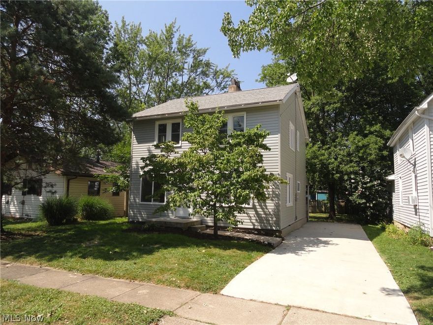 Beautiful 3 bed colonial with updates and charm inside and out. Great curb appeal from the new siding and new windows. Fresh paint and new flooring throughout entire home. Sparkling kitchen with new cabinets, countertops, flooring, sink, and fully applianced. Formal dining room is open to the kitchen and living room. The floor plan is great for entertaining and holidays. Bricked decorative fireplace and open stairway add character to the living room. Completely updated bathroom with new shower/tub, vanity, flooring, and lighting. All three bedrooms have fresh paint and new carpet. The back yard has a covered back patio with treed view and wood fence for privacy. New hot water tank and furnace. Updated electrical. Updated plumbing. This home is ready for you to move in and enjoy.