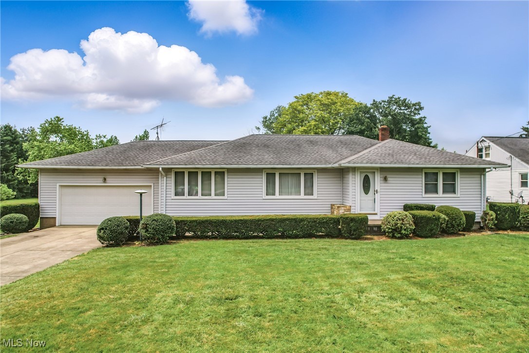 Peaceful Country Living! Discover the charm of country living with the convenience of town just down the road! This well-kept 3-bedroom ranch offers the perfect blend of comfort, space, and functionality on the outskirts of town. The heart of the home is the beautifully updated kitchen, featuring ceramic tile flooring, a custom built-in table, tiled backsplash, corner sink, and a spacious pantry—perfect for daily living and entertaining. The open family room and dining area offer a cozy shared space for relaxing or hosting, while the separate formal living room adds extra versatility. Enjoy the fresh look of the updated half bath with new flooring, modern vanity, and stylish shiplap accents. The master bedroom features a double closet for ample storage, and the full bath includes a tub/shower combo. A full basement provides plenty of room to grow, complete with a workshop area, laundry space, and additional storage. Outside, a 2-car garage offers added convenience. New carpet, new furnace & C/A, Kinetico water system & more. Welcome Home!