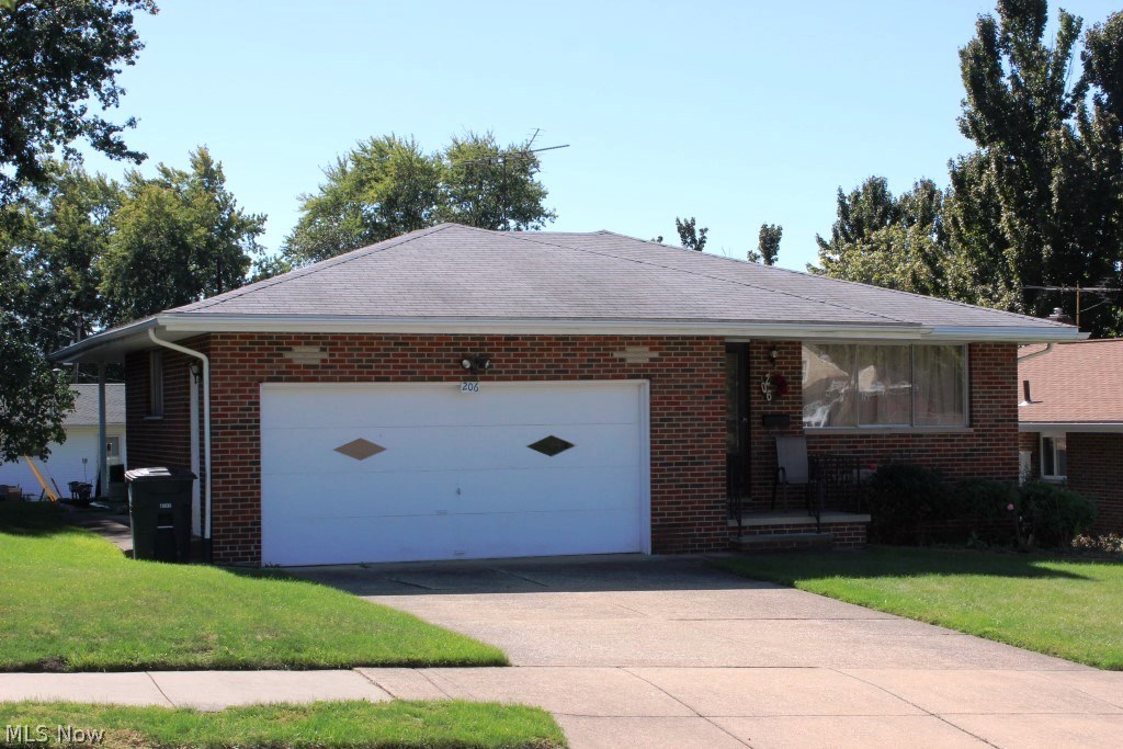 Delightful 3 bedroom, 2 bath brick ranch open & airy with approx. 1700SF (including finished lower level) & attached 2 car garage* Neutral decor & beautifully maintained* Spacious living room with carpet over wood floor* Dining room with wood like floor, built in glass cabinet & slider to covered patio* Kitchen with wood like floor, white cabinets, ceramic back splash, pantry, dishwasher (6 mo.), gas burner top, built in oven & disposal* 2 bedrooms with wood like floors, 1 bedroom with carpet over wood floor* Updated bath with laundry chute* Light & bright finished lower level with family room/rec room & bath* Washer & dryer included* Glass block windows in lower level* Shingles (single layer), soffits & gutters approx. 7 yrs.* 2 car garage has opener, cold water spigot & heat vent* Covered front porch* Immediate possession* A must see!