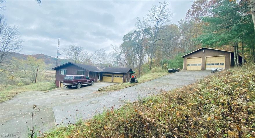 Are you in need of extra garage/shop space!?! This property offers 5.3 acres (with new survey),  3bd/1ba Ranch w basement featuring a (33’x60’) 
6-car, detached garage w 12' doors (all measurements appx). Also featuring; 2 attached garages (1 stall and a 2 stall). With a total capability of holding up to 9 cars. Driveway is completely paved to the house and all garages. House sits out a floodplain, but with views and access to the Hocking River for recreational purposes. Home is priced to reflect the ”As-Is” condition. Which creates the perfect opportunity for custom remodeling to your exact needs and style.  If you have the ability to envision a house in “finished condition” and don’t mind using some grit...then you will conceive a house that anyone would be proud to show off!!