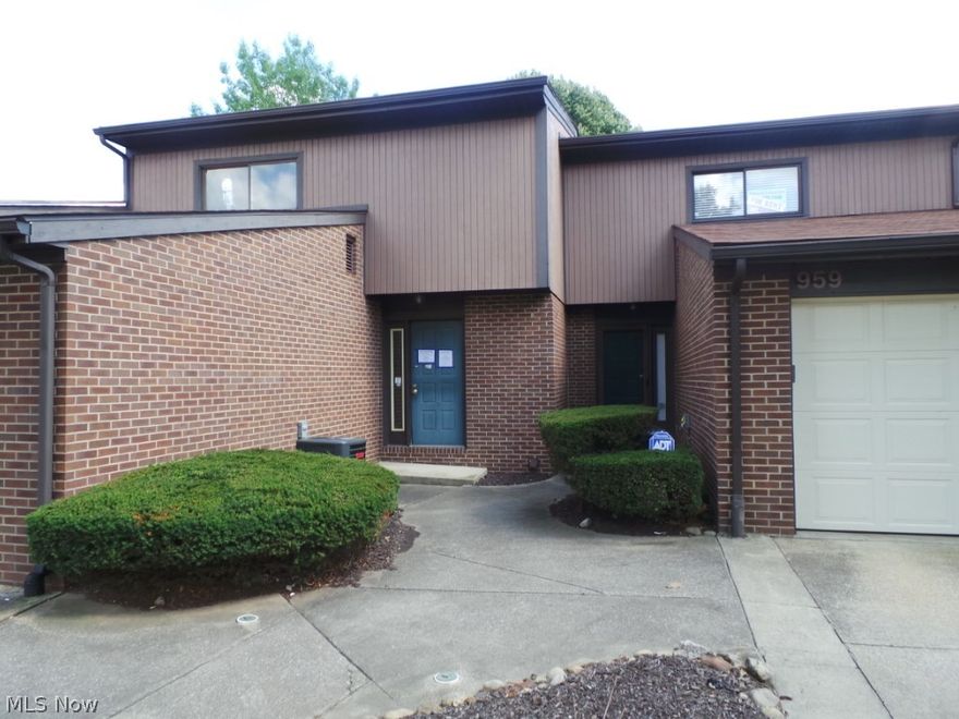 Prime Downtown Townhouse living - Great access to hospitals, University of Akron and I-76 and 77.  Bright open living space. Gas FP in the living room with slider to deck. Spacious eat-in kitchen and dining area.  Finished lower level w/half bath. Property is sold AS IS.  Equal housing opportunity. FHA insurable w/escrow per HUD appraisal.