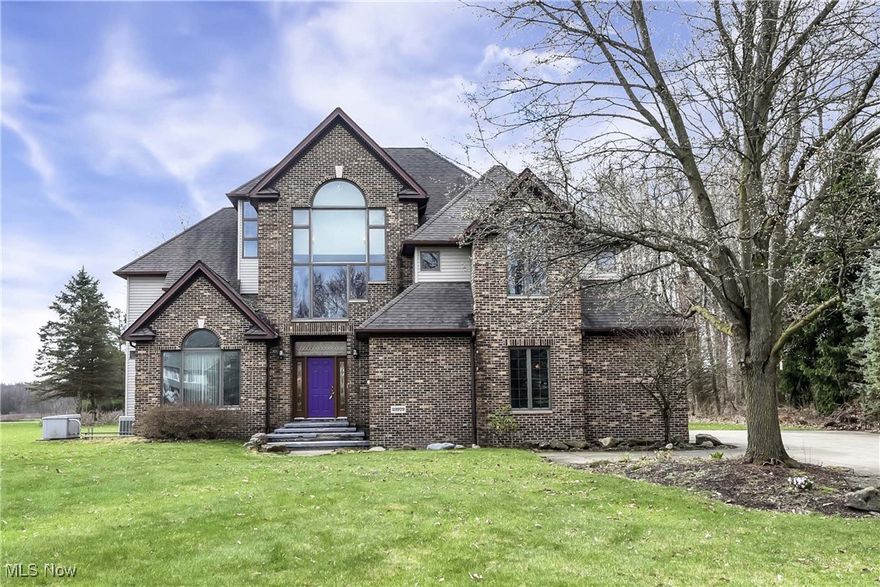Prepare to be moved! Welcome to 23979 West Rim Drive, a stunning custom-built home in the serene Lorain County Metro Park River Valley. This exquisite 3-bedroom, 2.5-bathroom residence spans 3,031 square feet across three levels and is designed for both relaxation and entertainment. 

Impressive curb appeal and a spacious two-car garage (with ample storage room) make a noteworthy first impression. A grand staircase and entryway greet you with elegance, while the formal dining room, featuring built-in cabinets and a picturesque window, sets the stage for memorable meals. The adjacent kitchen flows into the spacious great room, which boasts a recessed ceiling, a fireplace, and large windows framing scenic views. A cozy family room/sunroom extends the living area, offering peaceful retreats. A half bathroom and a versatile office space complete this level. 

The staircase leads to an open second-level area, ideal for a library or study with custom built-in bookshelves. The second floor also features two generous bedrooms, a full bathroom, and a conveniently located laundry space. The true jewel of this level is the luxurious primary suite which boasts a private balcony, a cozy fireplace, and ample space for a serene retreat. The adjoining primary bathroom is a spa-like, with a stunning garden tub beneath a picture window, a large shower, and an expansive vanity area. 

The third floor features its own fireplace and ample open space for entertainment or relaxation. With a potential fourth bedroom and plumbing for an additional half bathroom, this versatile area offers limitless potential. 

Whether you’re unwinding in your backyard sanctuary or taking a short drive to La Famiglia Winery or the Royal Crest Golf Club, the home’s location offers both retreat and adventure. Easy access to major highways and the airport makes commuting a breeze. 

Experience the perfect blend of luxury, comfort, and location at 23979 West Rim Drive - a true masterpiece!