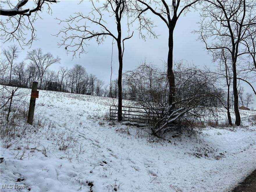 5 acres (subject to survey), great views, easy access. 1/2 tillable, 1/2 wooded. 
Buyer responsible for well and septic approval